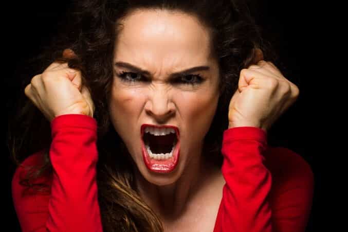 An angry woman is yelling
