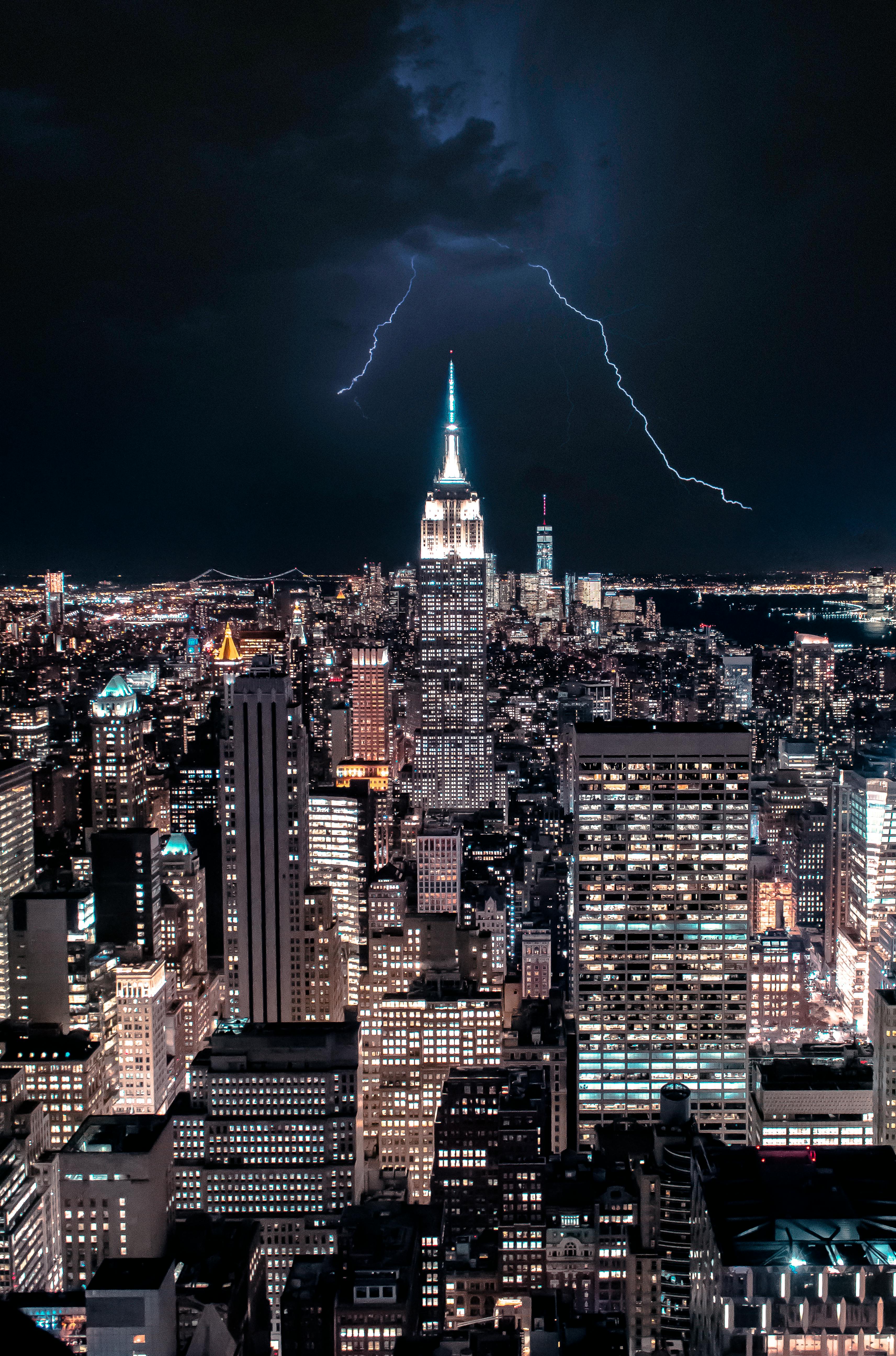 New York City at night, storm in the background at night