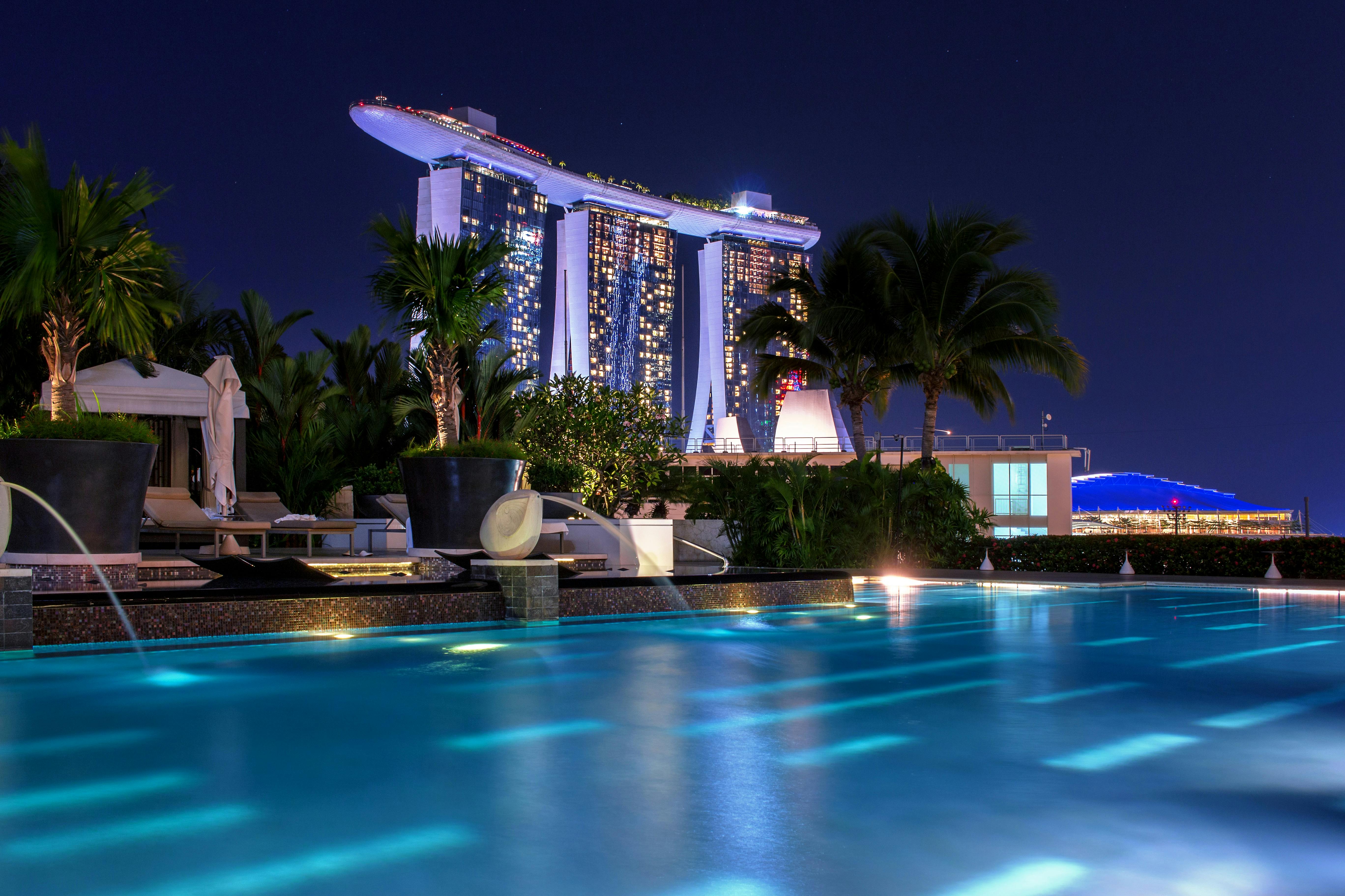 Singapore at night, pool and building